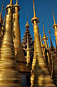 Inle Lake Myanmar. Indein, on the summit of a hill the  Shwe Inn Thein Paya a cluster of hundreds of ancient stupas. Many of them are ruined and overgrown with bushes. 